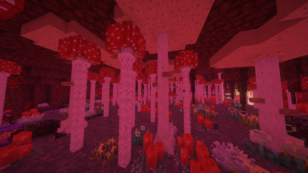 MinecraftのBetterNether Modによるネザーのキノコの森。赤と白の巨大なキノコが密集して生え、周囲に様々な小さな植物が彩りを添える。  
